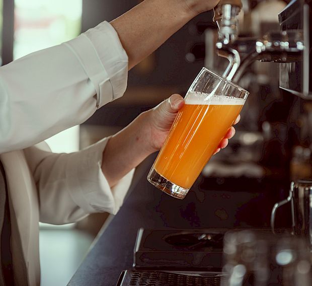 pulling beer from the tap