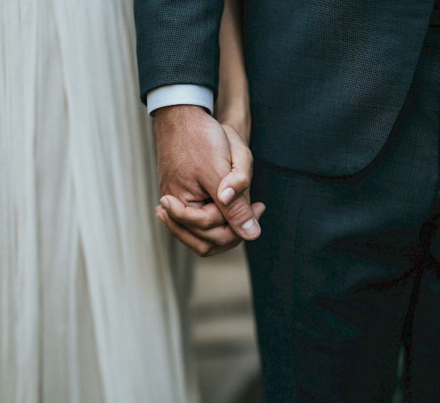 A couple holding hands