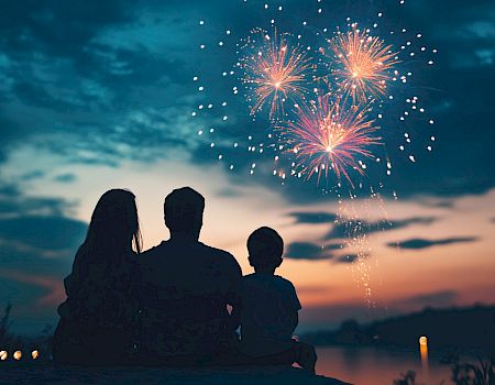 A family watching fireworks